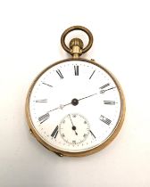 A 14 carat yellow gold Remontoir 15 rubis pocket watch with white enamel dial and black roman