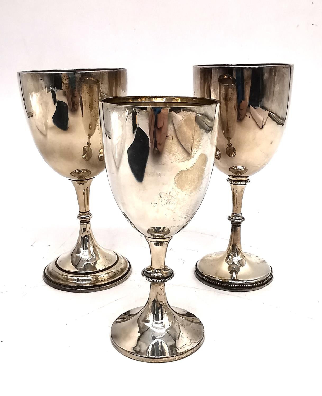 Three Victorian silver goblets, one by Alexander Clark & Co Ltd and one by Elkington & Co. Tallest