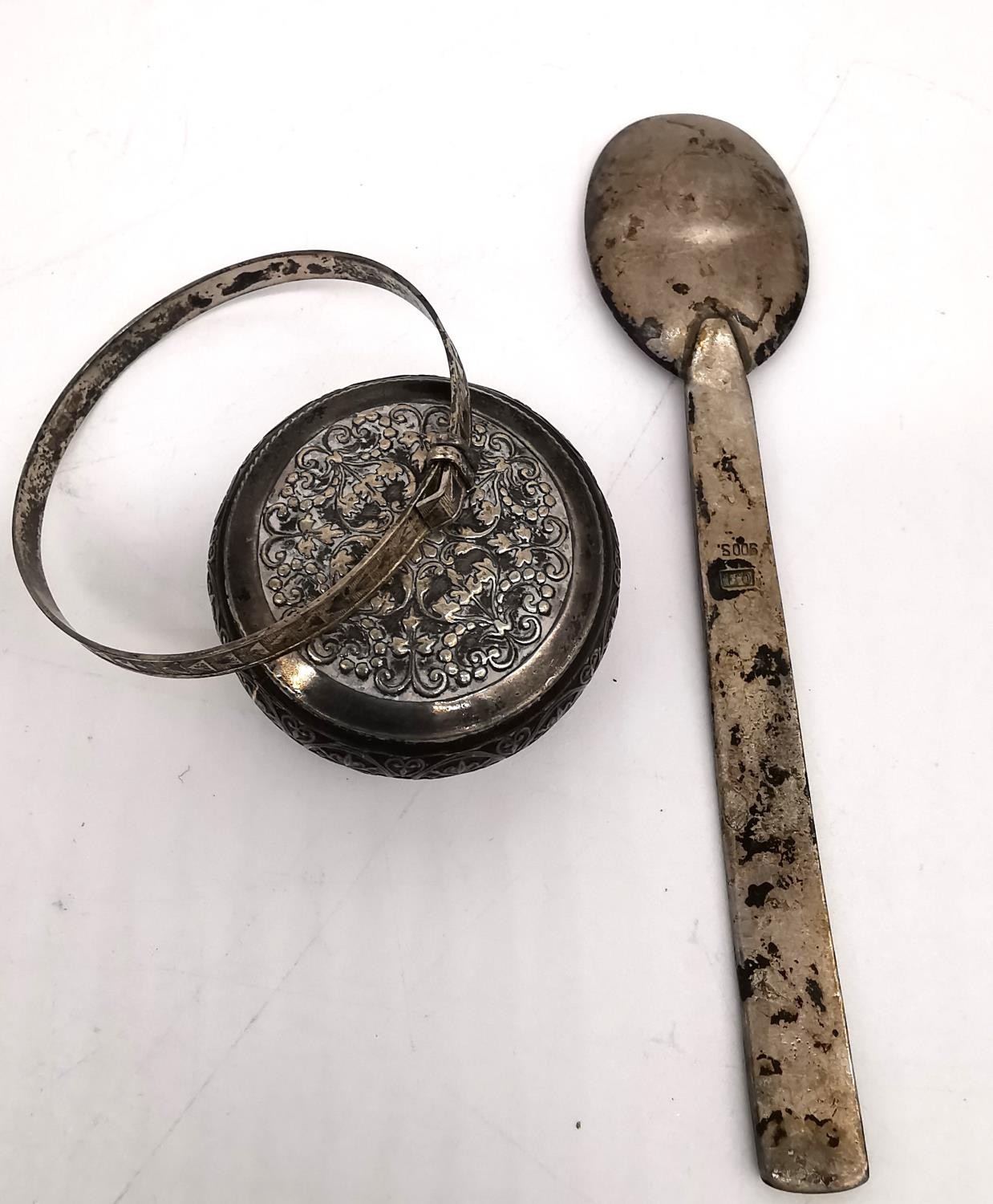 A collection of silver and white metal items, including a silver tea spoon, a silver baby bangle, - Image 14 of 18
