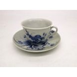 A Japanese 19th century hand painted porcelain small blue and white floral and foliate design teacup