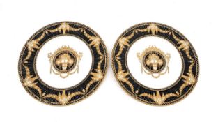 A pair of early 20th century Royal Worcester black transfer printed and hand gilded cabinet plates