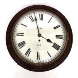 A early 20th century mahogany circular wall clock by Agar, York. Brass mechanism and white painted