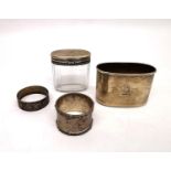 A collection of silver, including a silver sprung lid cut glass dressing jar by Thomas Johnson I and