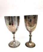 Two Victorian engraved silver goblets, one with a coat of arms and one with scrolling foliate