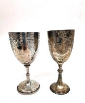 Two Victorian engraved silver goblets, one with a coat of arms and one with scrolling foliate