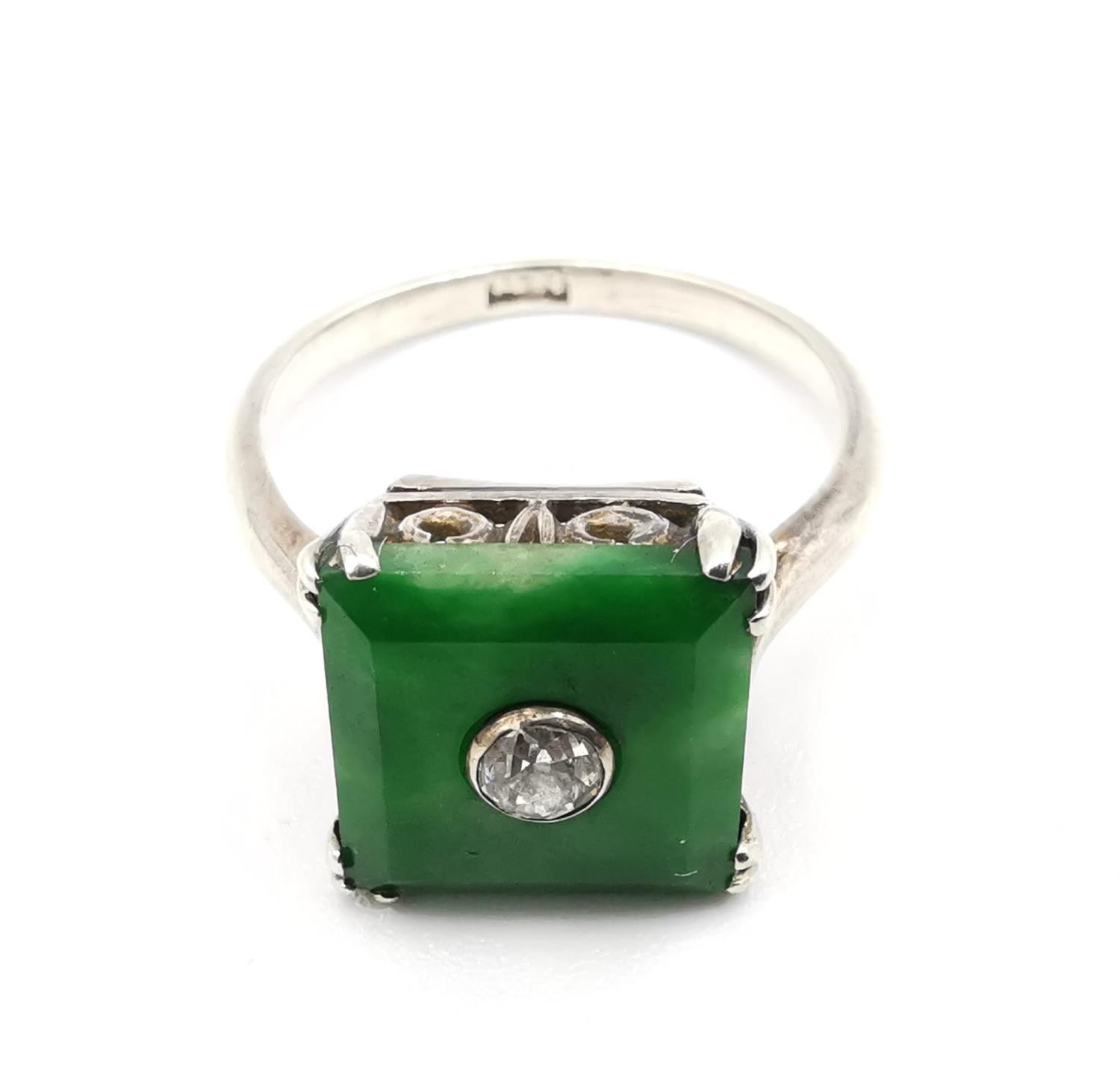 An Art Deco Chinese 14 carat white gold Jade and diamond dress ring. Set to centre of the square