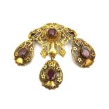 A 19th century Austrian yellow metal (tests as 18ct gold) filigree wirework and garnet set