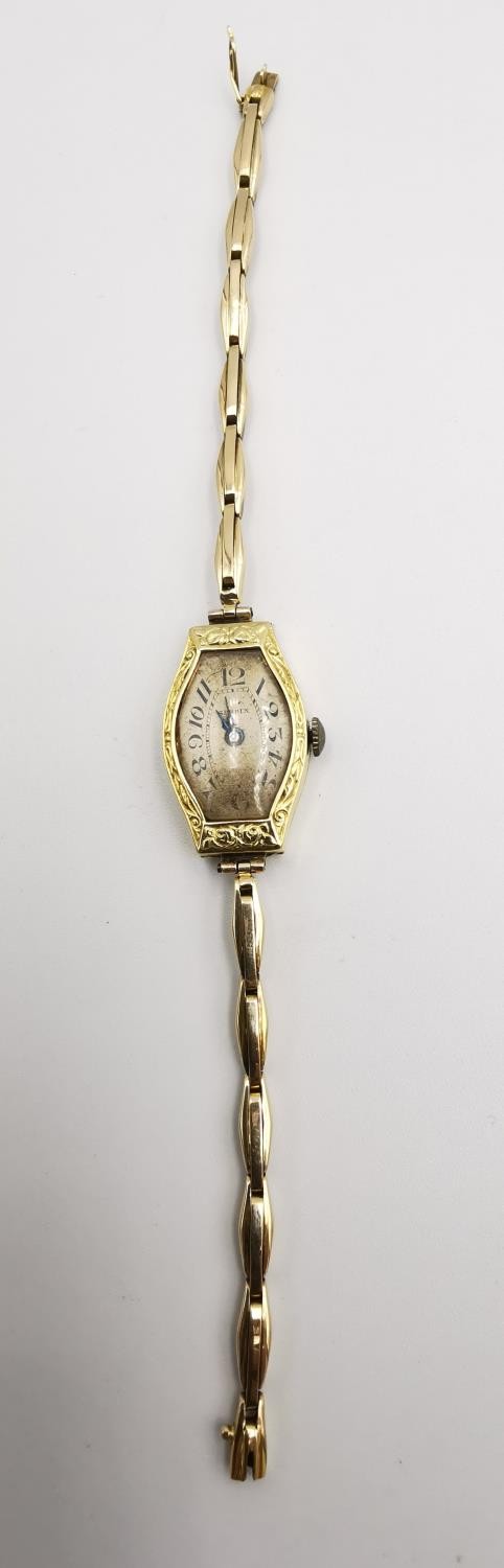 A vintage Serdix ladies automatic 18 carat yellow gold engraved cocktail watch with 9ct gold