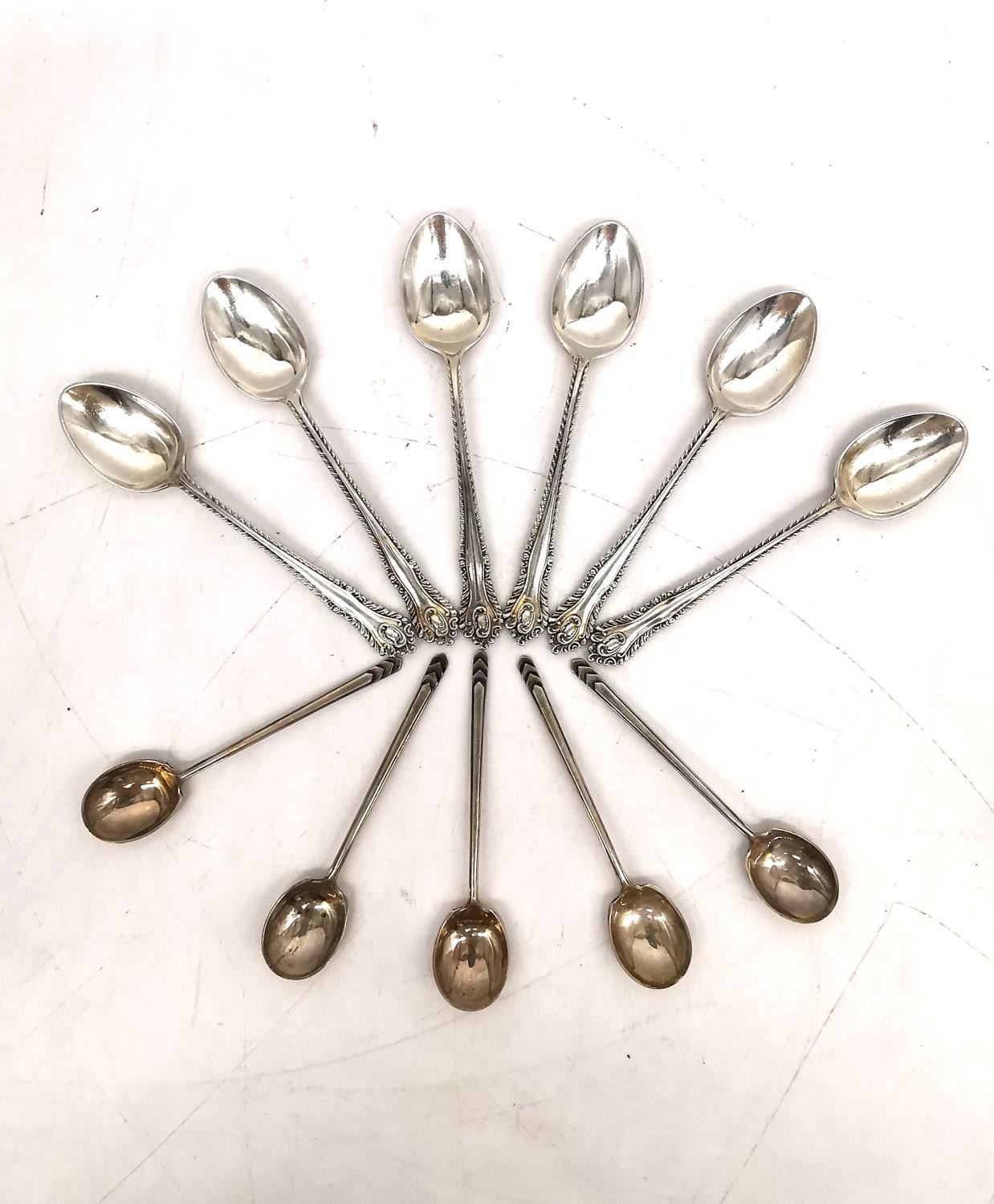 A leather cased set of six silver coffee spoons, six repousse silver teaspoons and five Art Deco - Image 3 of 10