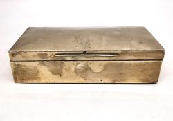 A silver cedar lined cigarette box by Goldsmiths and Silversmiths, Regent Street. Hallmarked: