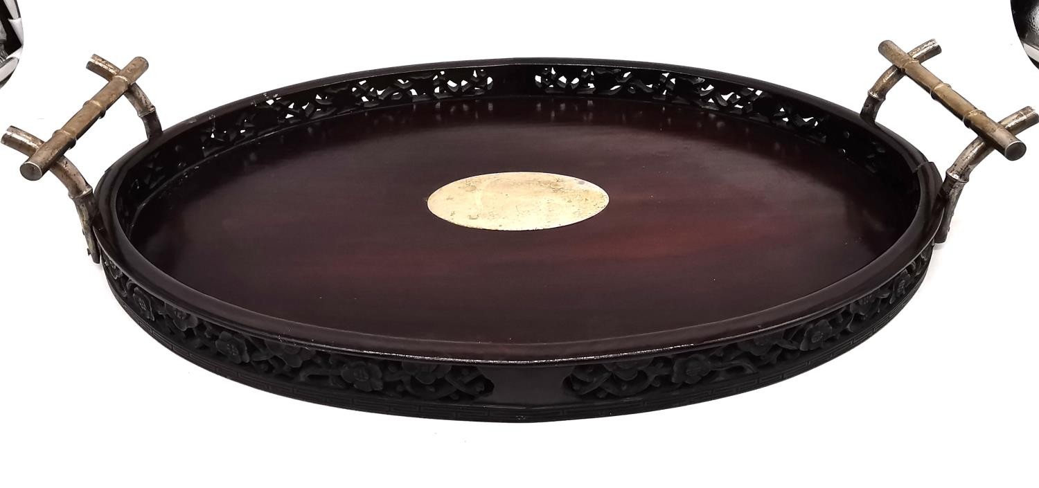 An early 20th century Chinese carved and pierced hardwood oval tray with white metal (tests as - Image 3 of 9