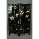 Screen or room divider, four panels, 20th century Chinese lacquered and gilded with mother of