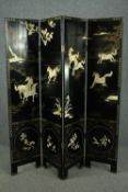 Screen or room divider, four panels, 20th century Chinese lacquered and gilded with mother of