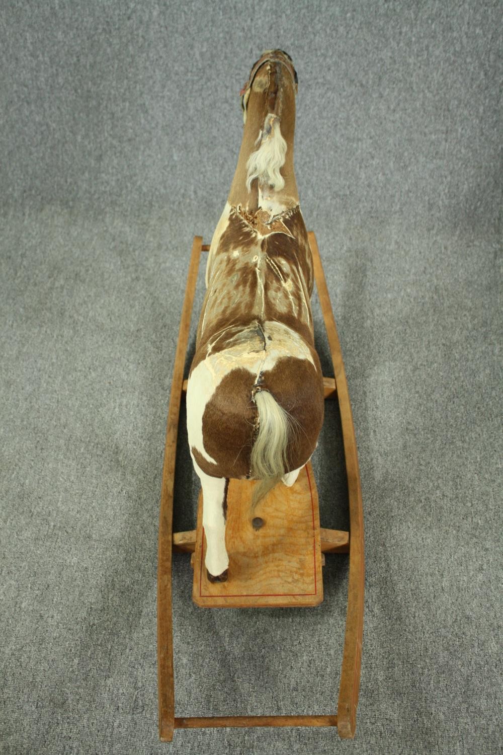 A vintage rocking horse in cowhide covering. H.74 W.110 D.38cm. - Image 13 of 14