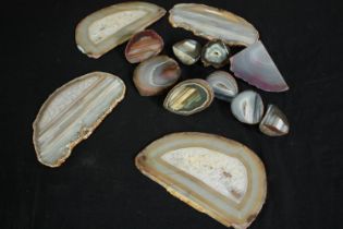 A collection of eleven agate geode pieces and slices, some dyed. L.20cm. (largest) Proceeds from