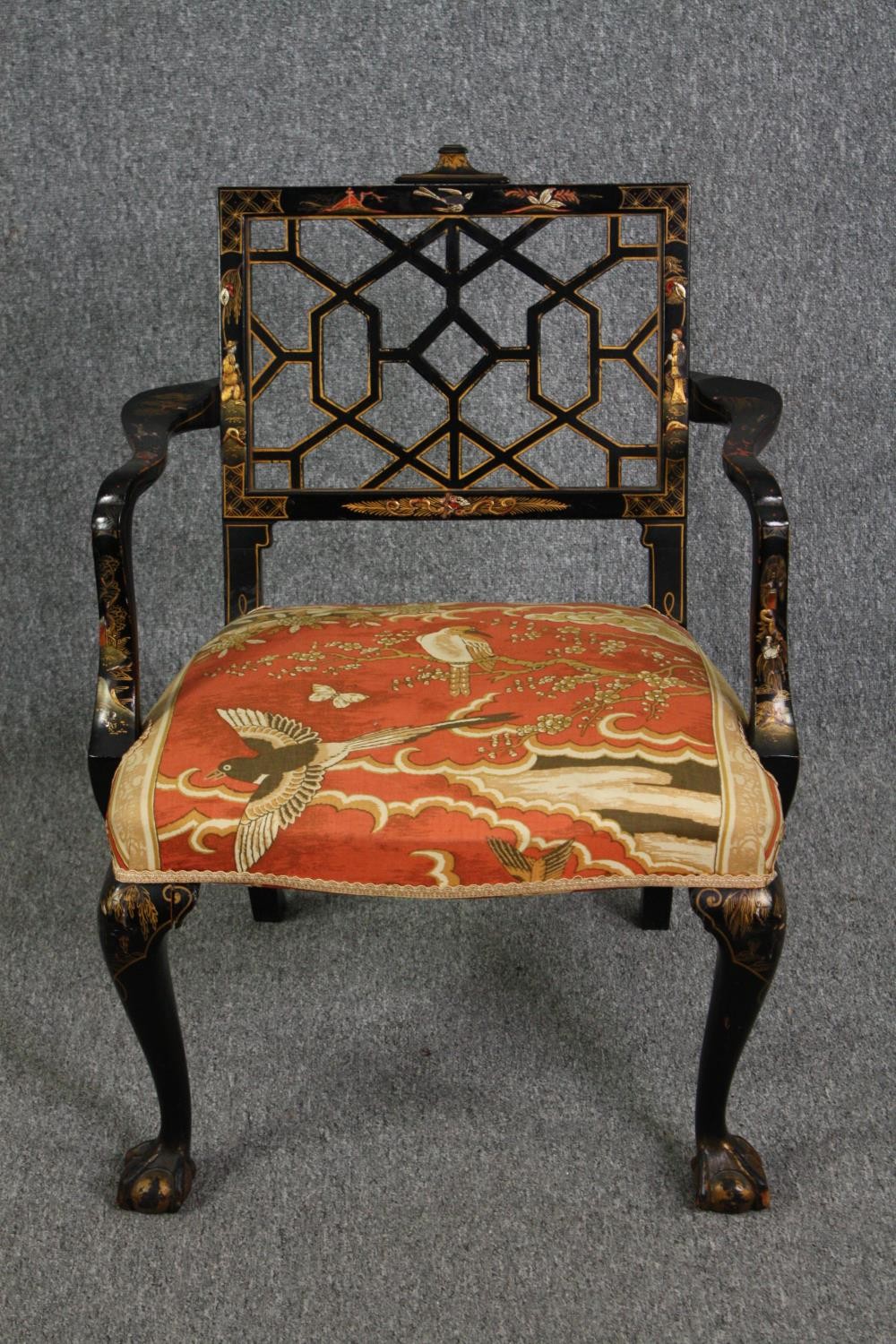 A Chinese Chippendale style lacquered armchair hand decorated in gilt. H.80cm.