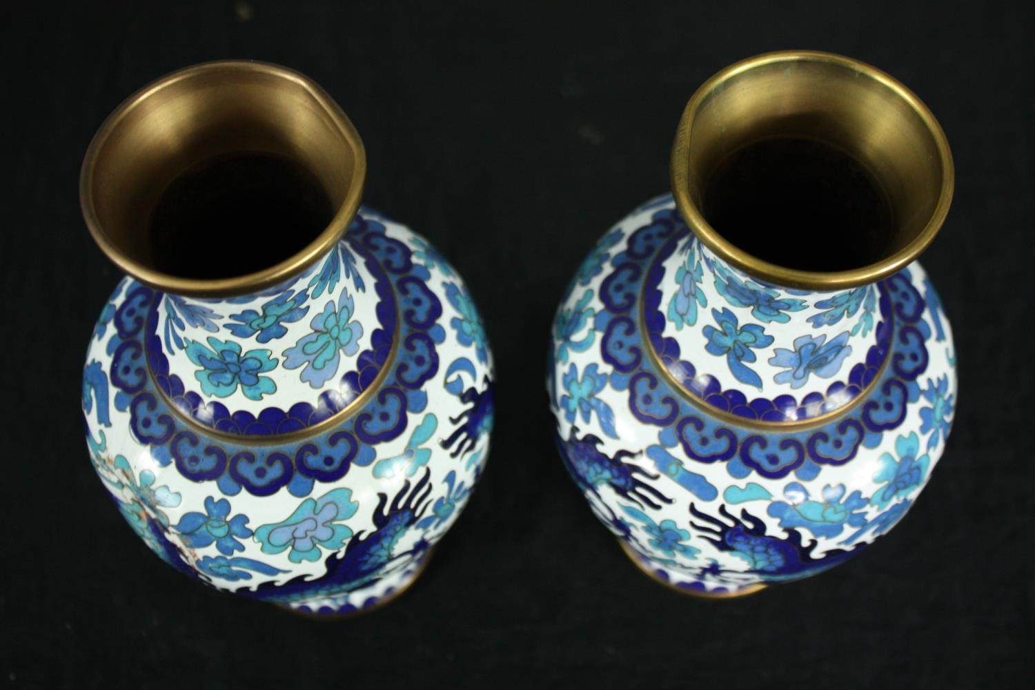 A pair of Japanese blue and white cloisonné enamel vases with dragon and floral motifs. H.21cm. ( - Image 3 of 4