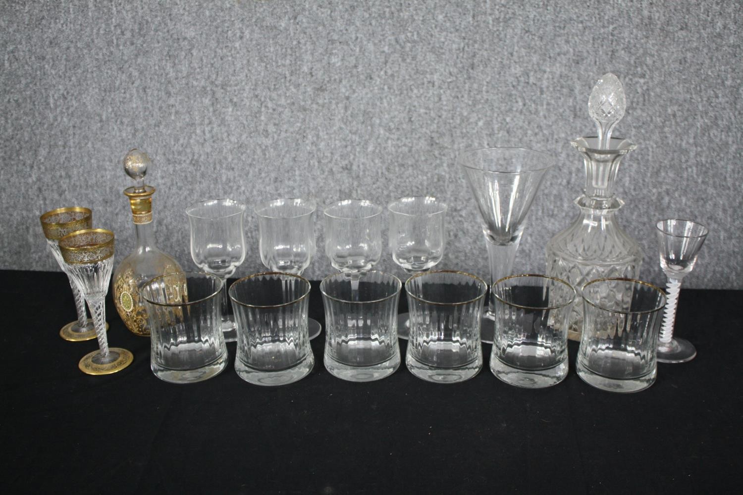 A mixed collection of glass: A conical Whitefriars glass, Baccarat wine glasses, a Bohemian gilt