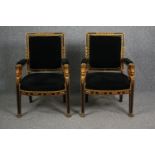 Armchairs, a pair, 19th century Empire style, ebonised and gilt. H.95cm. (Each).