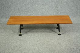 Coffee table, 1960s teak with ebonised splay supports on pad feet. H.29 W.48 D.28cm.