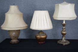 A vintage carved giltwood table lamp and two ceramic baluster form table lamps. H.93cm. (Largest).