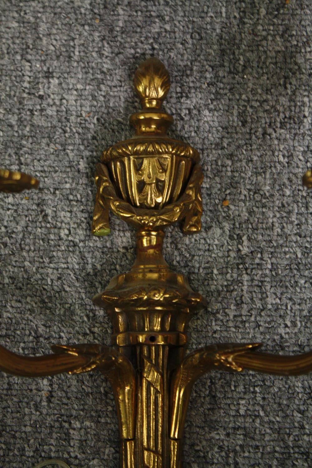 A pair of gilt metal Classical design brass twin branch wall sconces. H.66cm. (Each). - Image 7 of 8