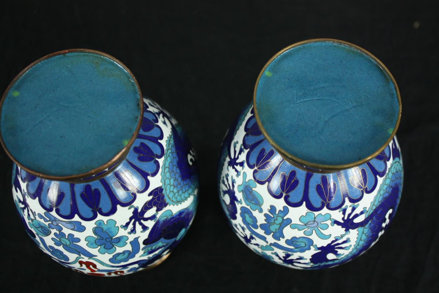 A pair of Japanese blue and white cloisonné enamel vases with dragon and floral motifs. H.21cm. ( - Image 4 of 4