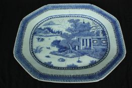 A 19th century blue and white meat plate. L.51 W.43cm. (With old crack as seen).