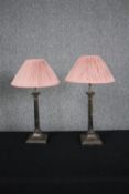 A pair of 19th century silver plated candlesticks converted to table lamps. H.55cm. (Each).