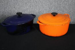 Two Le Creuset casserole pots. Dia.27cm. (Largest).