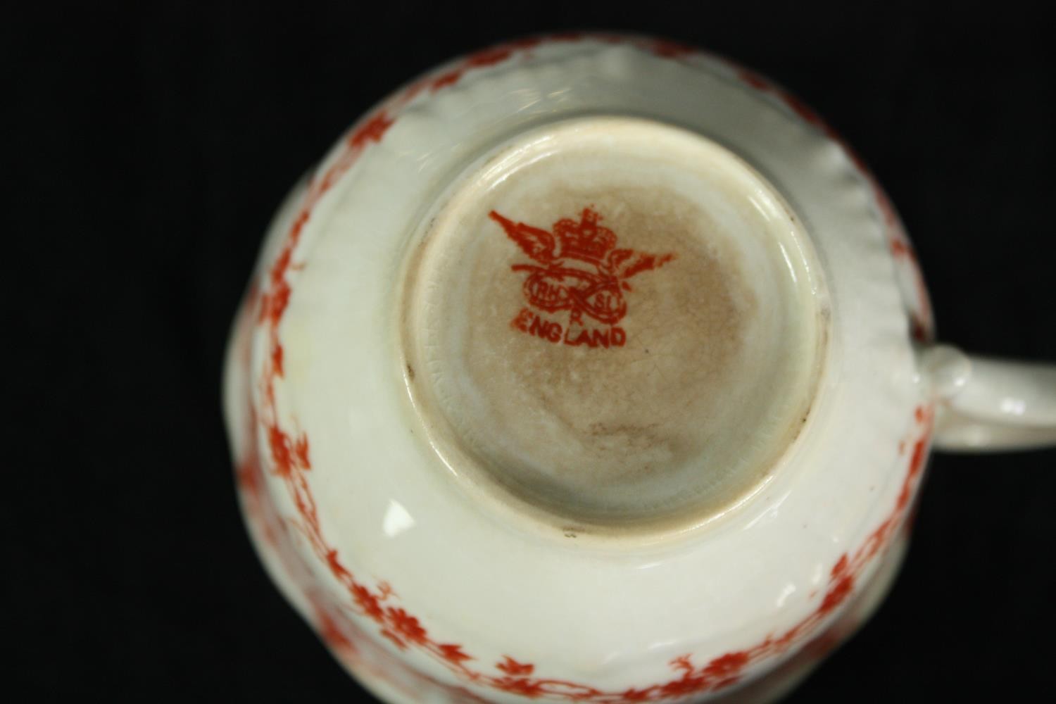 A collection of tea cups and saucers, including an orange and white early 20th century floral design - Image 14 of 19