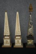 A pair of painted obelisks along with faux marble example with a pineapple finial. H.76 cm. (