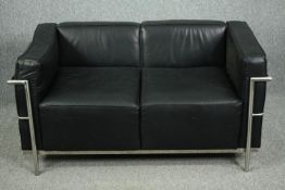After Le Corbusier, an LC2 sofa in chrome and leather. H.68 W.131 D.75cm.