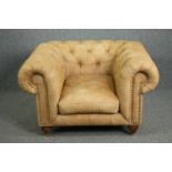 Chesterfield armchair, contemporary in deep buttoned leather upholstery with a nubuck finish. H.73