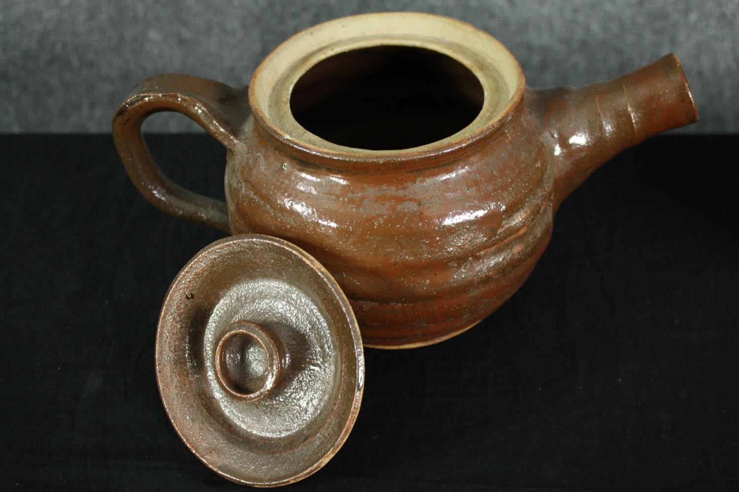 A mixed collection of pottery including a teapot with a flared spout, a jug, and three vases. The - Image 3 of 11