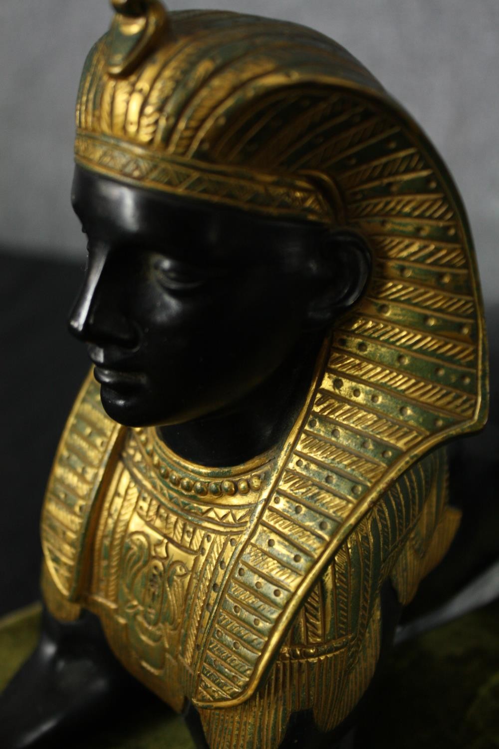 A Grand Tour Egyptian Revival spelter and gilt figure of a recumbent Sphinx. H.20 W.43 D.14cm. - Image 5 of 5