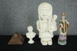 A collection of ceramic figures and a hieroglyphic decorated pyramid. Includes a figure of St.