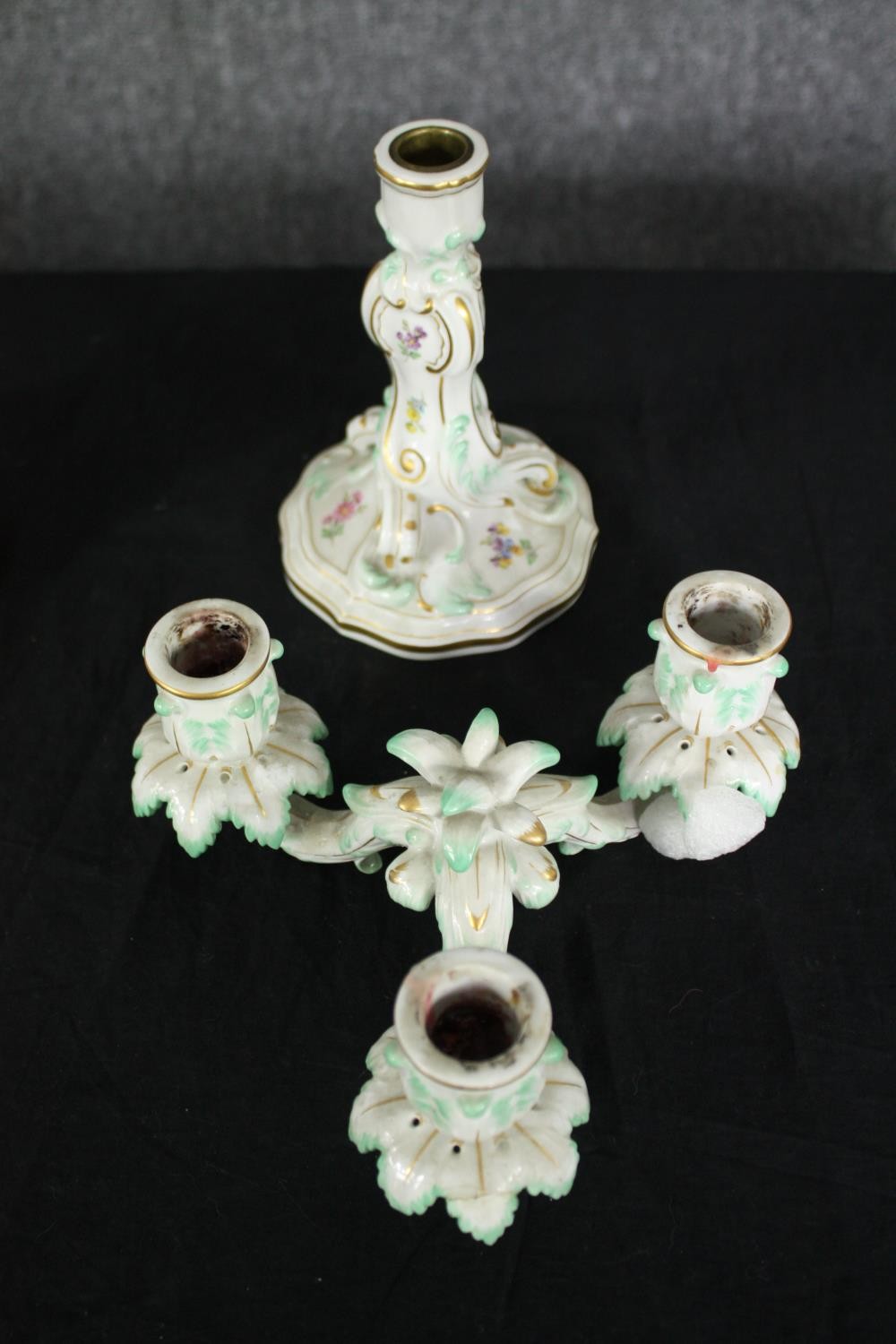 A pair of Meissen candelabras along with a larger similar example. H.38cm. (Largest). Repairs and - Image 4 of 7