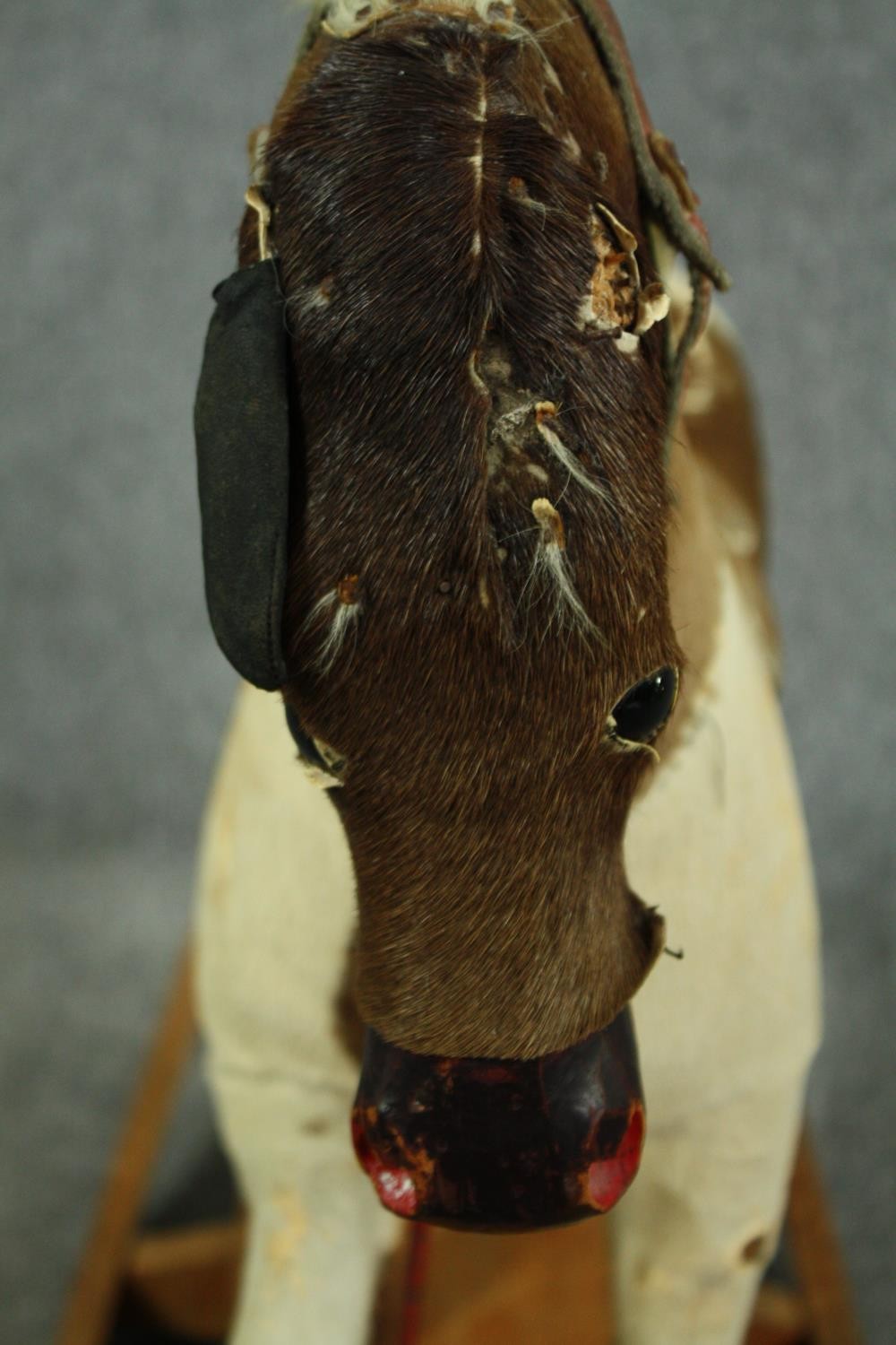 A vintage rocking horse in cowhide covering. H.74 W.110 D.38cm. - Image 8 of 14