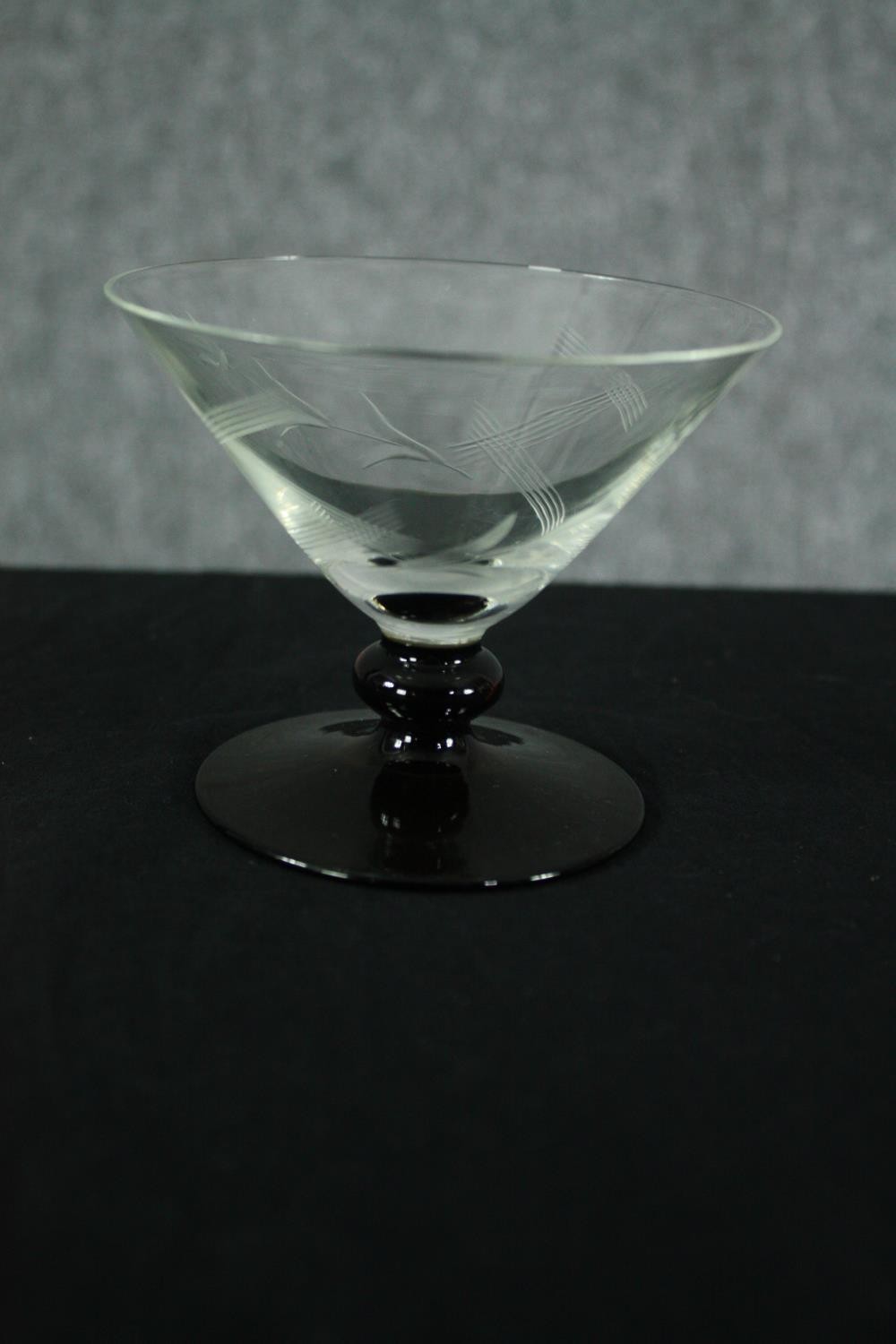 A Swedish smokey etched glass spherical decanter with conical stopper and four matching glasses - Image 5 of 7