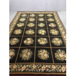 Carpet, Aubusson style with floral spray motifs across the field within a complementary border, by