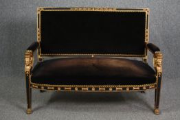 Canape, 19th century Empire style, ebonised and gilt. H.98 W.120 D.55cm.