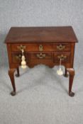 Lowboy, mid Georgian walnut with original brass fittings. H.72 W.75 D.46cm.