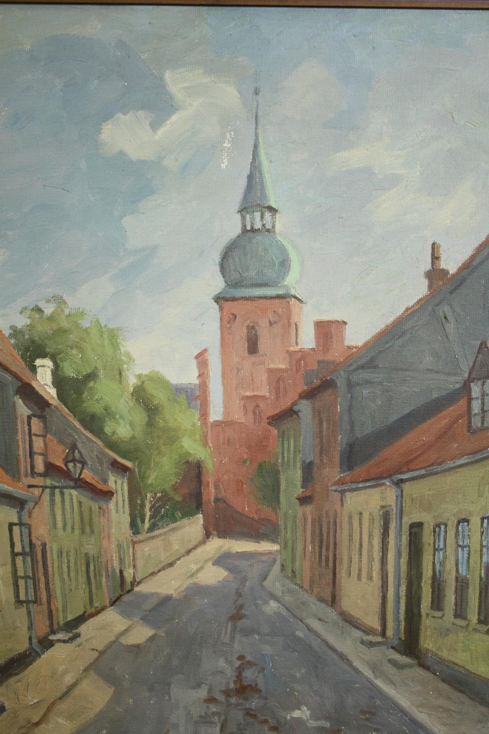 Oil on board. A street scene with church. Eastern European, signed ’M. Nielsen’ lower right. Early