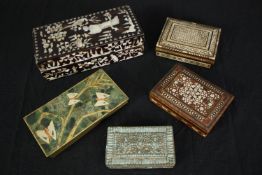 A collection of five boxes, to include, Damascus, Mother of Pearl and Chinese blue glass inlaid. H.8