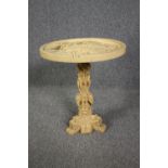 Occasional table, Eastern influenced moulded, in two parts. H.51 Dia.45cm. (Some damage as seen).