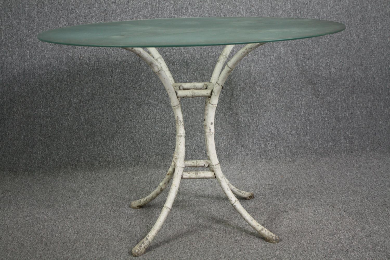 Garden or conservatory table, plate glass on faux bamboo painted metal base. H.75 Dia.107cm. - Image 2 of 3