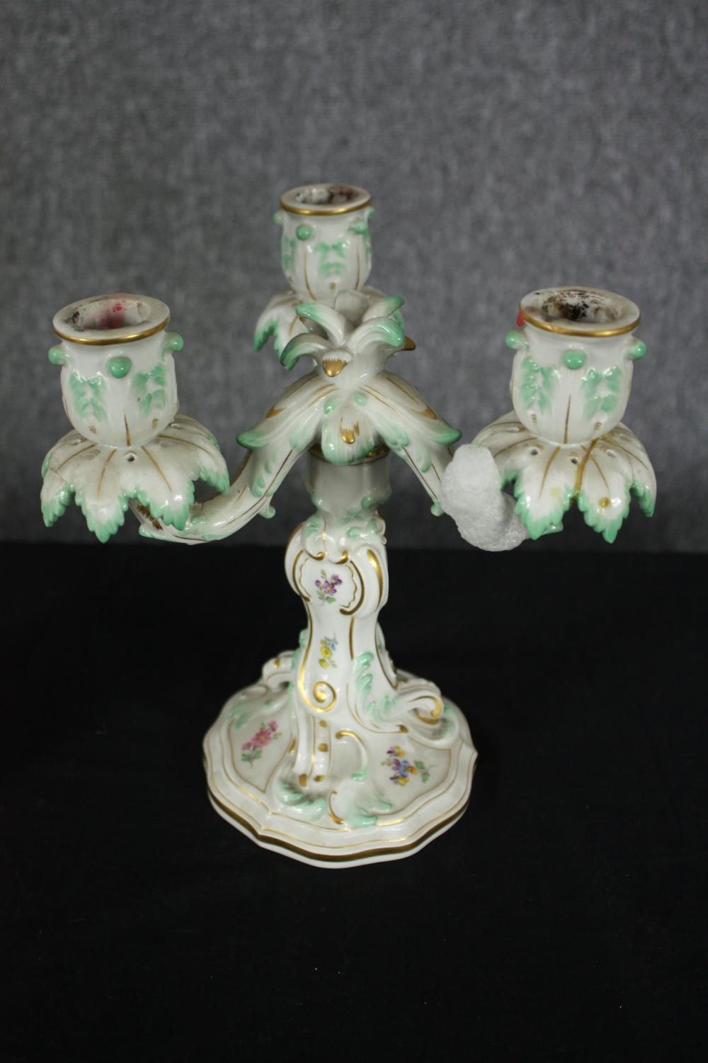 A pair of Meissen candelabras along with a larger similar example. H.38cm. (Largest). Repairs and - Image 3 of 7