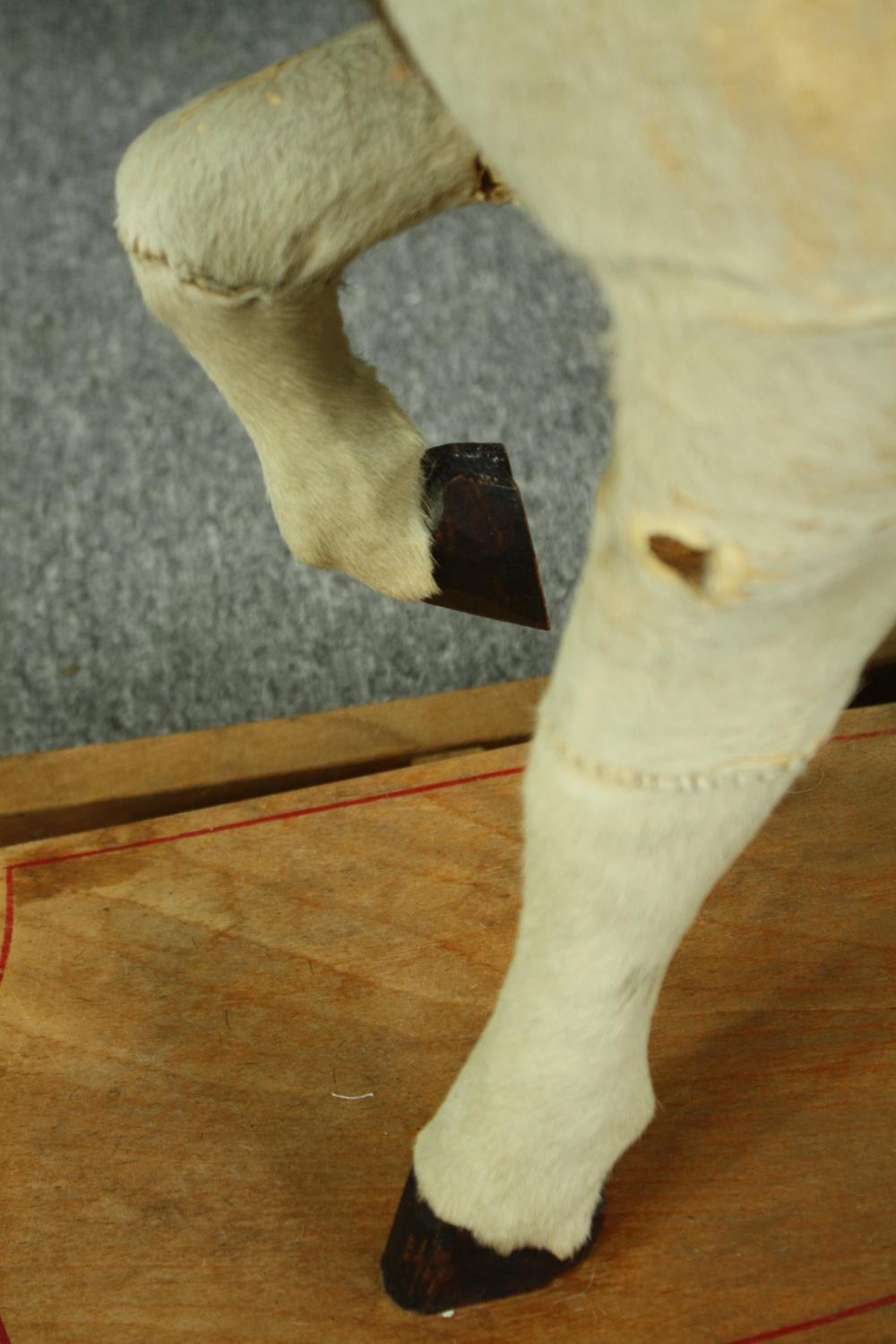 A vintage rocking horse in cowhide covering. H.74 W.110 D.38cm. - Image 11 of 14