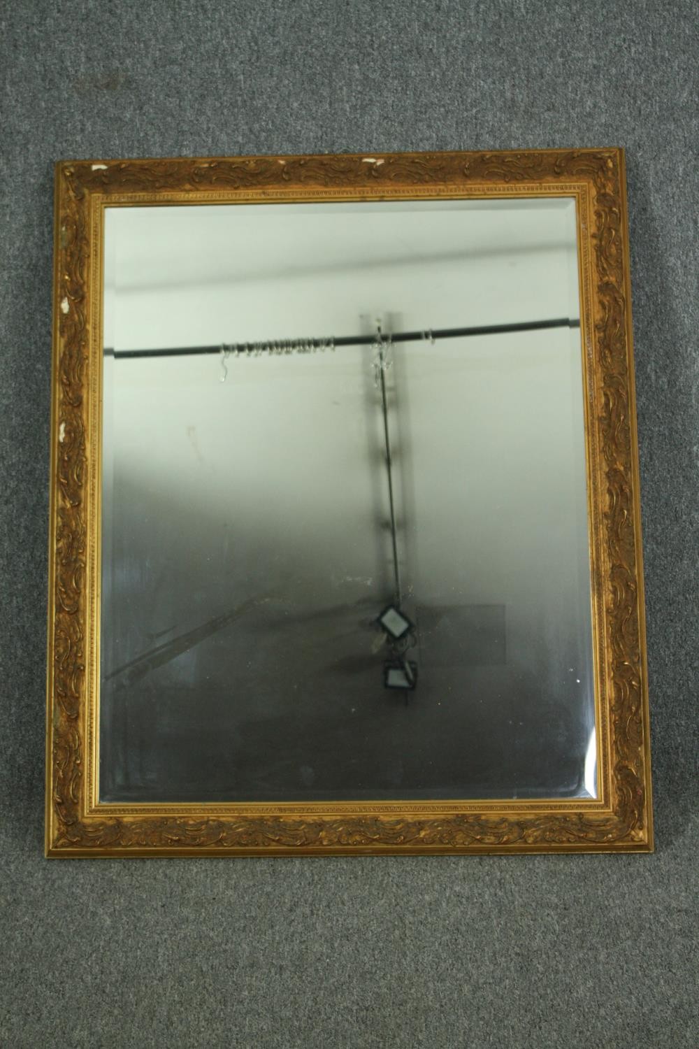 Wall mirror, contemporary giltwood frame with bevelled plate. H.117 W.95cm.